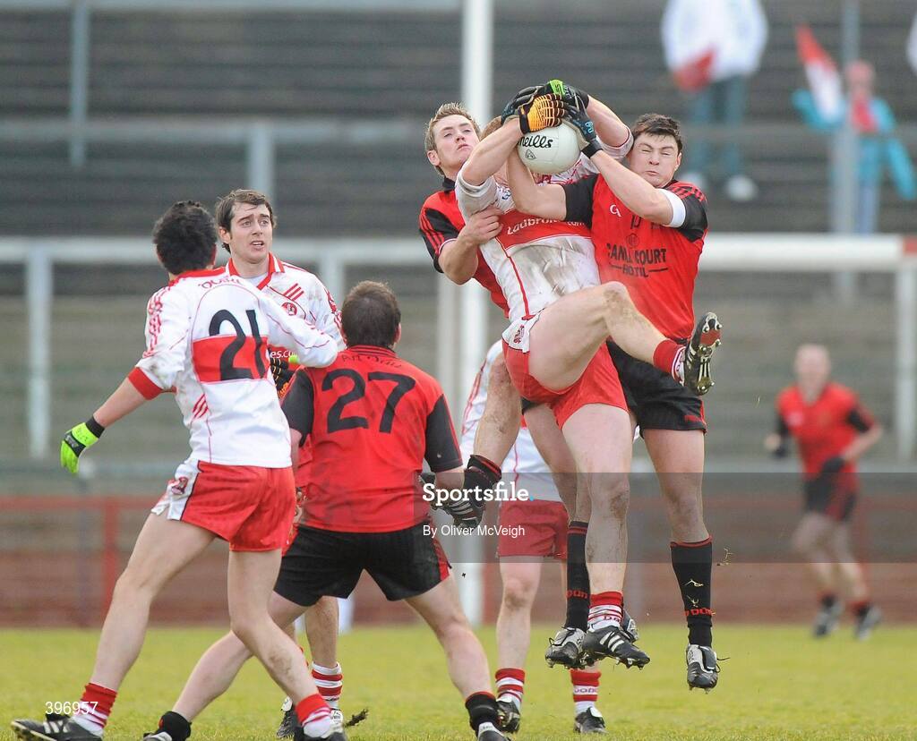 24 January 2010; Fergal Doherty, Derry, in action against Martin Clarke, Down. Barrett Sports Lighting Dr. McKenna Cup, Group C, Derry v Down, Celtic Park, Derry. Picture credit: Oliver McVeigh / SPORTSFILE