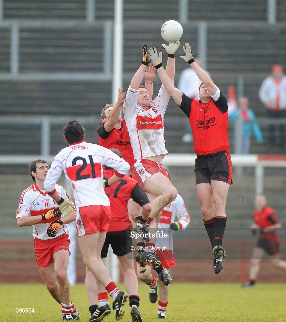 24 January 2010; Fergal Doherty, Derry, in action against Martin Clarke, Down. Barrett Sports Lighting Dr. McKenna Cup, Group C, Derry v Down, Celtic Park, Derry. Picture credit: Oliver McVeigh / SPORTSFILE