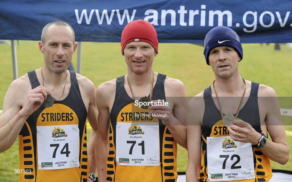 23 January 2010; Paul Carroll, Annadale Striders, third, Dave Morwood, Annadale Striders, winner, and Mark Wright, Annadale Striders, second, on the podium after  the Male Masters race. Antrim IAAF International Cross Country, Greenmount Campus, Belfast, Co. Antrim. Picture credit: Oliver McVeigh / SPORTSFILE