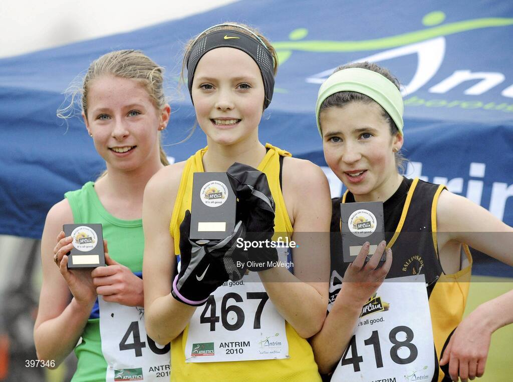 23 January 2010; Megan Bates, Eden Runners, thrid, Chloe Cowan, Giffnock North, winner, and Annie Tynan-Daly, Ballinasloe and District, second, in the Under 13 Girls race, Antrim IAAF International Cross Country. Greenmount Campus, Belfast, Co. Antrim. Picture credit: Oliver McVeigh / SPORTSFILE