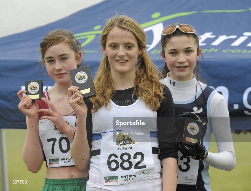 23 January 2010; Lindra Conroy, Mullingar Harriers AC, third place, left, Rachel Dunn, Edinburgh AC, winner, centre, and Yasmin Wilson, City of Lisburn AC, second place, celebrate with their plaques after the Under 15 Girls Race. Antrim IAAF International Cross Country. Greenmount Campus, Belfast, Co. Antrim. Picture credit: Oliver McVeigh / SPORTSFILE
