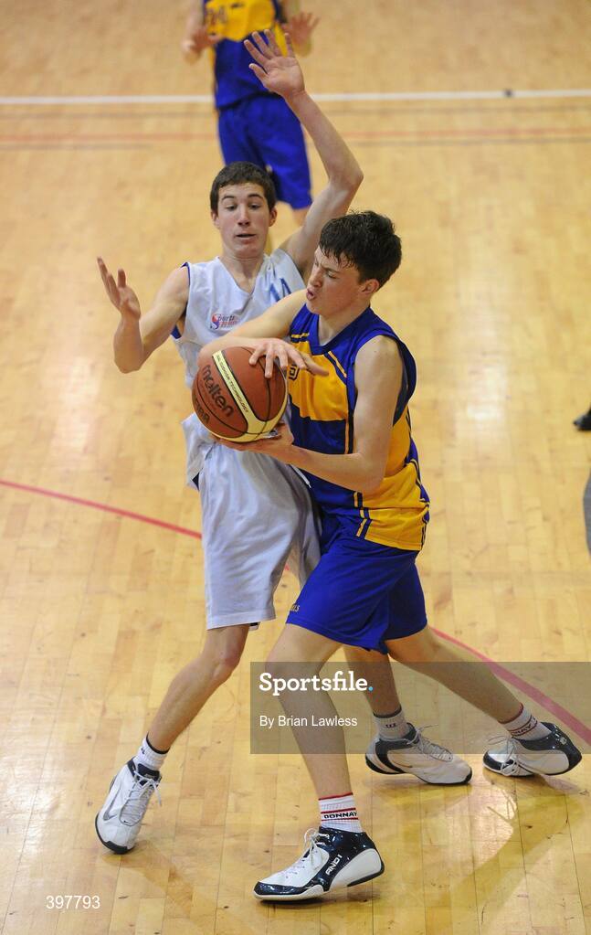 27 January 2010; Dylan Ogle, Patrician High School, Monaghan, in action against Colm O'Sullivan, Pobailscoil Inbhear Sceine, Kerry. All-Ireland School Cup Finals 2010 - U16 Boys B Final, Patrician High School, Monaghan v Pobailscoil Inbhear Sceine, Kerry, National Basketball Arena, Tallaght, Dublin. Picture credit: Brian Lawless / SPORTSFILE