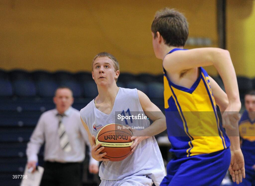 27 January 2010; Gavin Crowley, Pobailscoil Inbhear Sceine, Kerry, in action against Aaron Lynch, Patrician High School, Monaghan. All-Ireland School Cup Finals 2010 - U16 Boys B Final, Patrician High School, Monaghan v Pobailscoil Inbhear Sceine, Kerry, National Basketball Arena, Tallaght, Dublin. Picture credit: Brian Lawless / SPORTSFILE