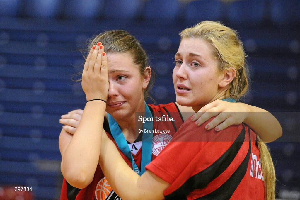 27 January 2010; Sisters Jessica, left, and Georgia McGurk, Alexandra College, Dublin, console each other after defeat in the final. All-Ireland School Cup Finals 2010 - U19 Girls C Final, Alexandra College, Dublin v Abbey Vocational School, Donegal, National Basketball Arena, Tallaght, Dublin. Picture credit: Brian Lawless / SPORTSFILE