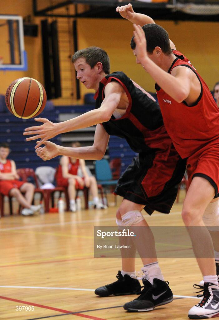 27 January 2010; Seamus Hickey, St. Eunans, Letterkenny, in action against John Chubb, Chanel College, Dublin. All-Ireland School Cup Finals 2010 - U19 Boys B Final, St. Eunans, Letterkenny v Chanel College, Dublin, National Basketball Arena, Tallaght, Dublin. Picture credit: Brian Lawless / SPORTSFILE