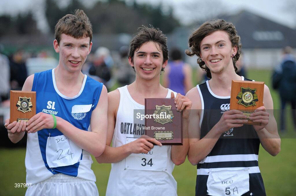27 January 2010; Emmet Jennings, centre, from Oatlands College, Stillorgan, with 3rd place Stephen Lawlor, left, from Knockbeg College, Co. Carlow, and 2nd place Jayme Rossitor, from Belvedere College, Dublin, with their plaques afterthe Senior Boys 1500m race at the DCU Invitational Cross Country competition. Dublin City University, Glasnevin, Dublin. Picture credit: Matt Browne / SPORTSFILE