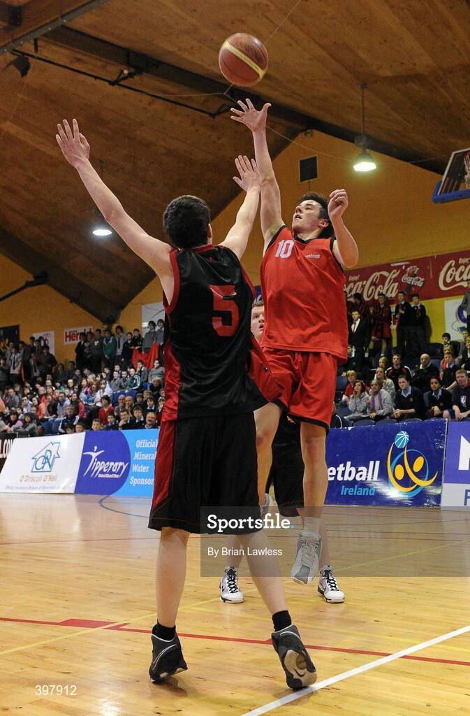 27 January 2010; Adam Ingle, Chanel College, Dublin, in action against Ciaran Hegarty, St. Eunans, Letterkenny. All-Ireland School Cup Finals 2010 - U19 Boys B Final, St. Eunans, Letterkenny v Chanel College, Dublin, National Basketball Arena, Tallaght, Dublin. Picture credit: Brian Lawless / SPORTSFILE