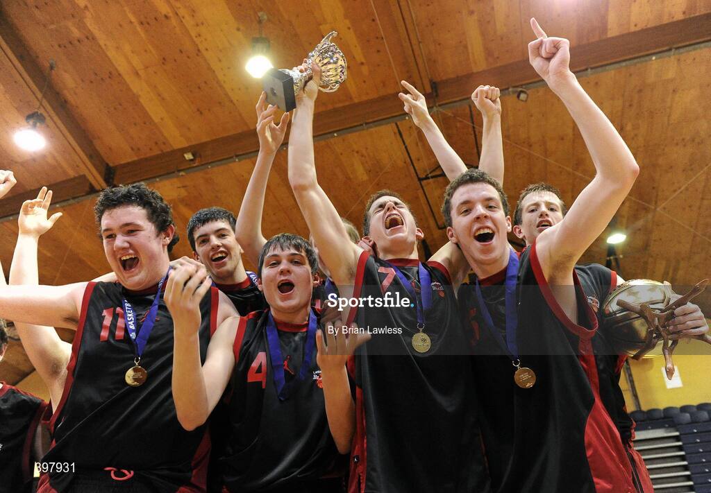 27 January 2010; St. Eunans players celebrate with the cup. All-Ireland School Cup Finals 2010 - U19 Boys B Final, St. Eunans, Letterkenny v Chanel College, Dublin, National Basketball Arena, Tallaght, Dublin. Picture credit: Brian Lawless / SPORTSFILE