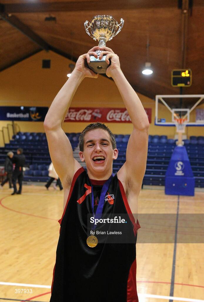 27 January 2010; St. Eunans captain Aodhán Hickey lifts the cup. All-Ireland School Cup Finals 2010 - U19 Boys B Final, St. Eunans, Letterkenny v Chanel College, Dublin, National Basketball Arena, Tallaght, Dublin. Picture credit: Brian Lawless / SPORTSFILE