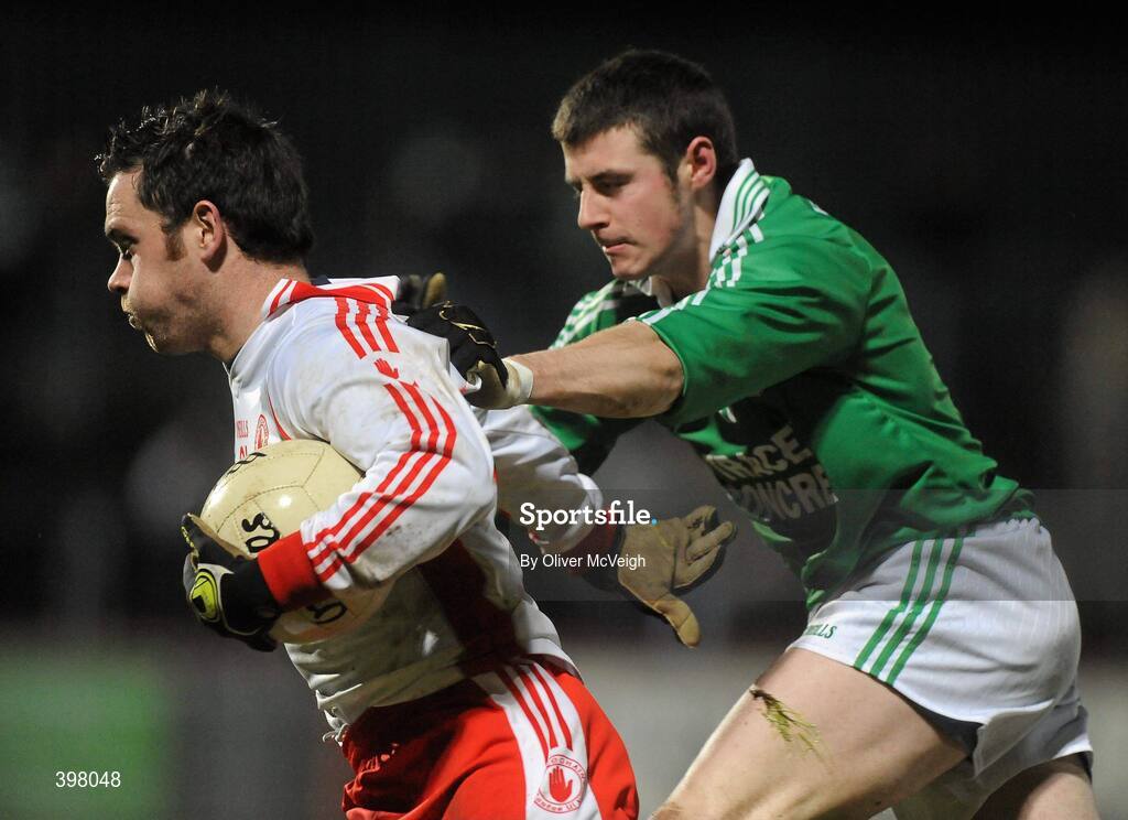 27 January 2010; Martin Penrose, Tyrone, in action against Michael Jones, Fermanagh. Barrett Sports Lighting Dr. McKenna Cup Semi-Final, Tyrone v Fermanagh, Healy Park, Omagh, Co. Tyrone. Picture credit: Oliver McVeigh / SPORTSFILE