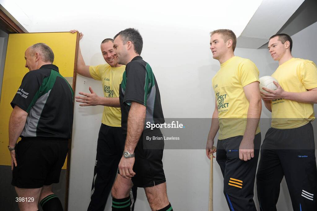28 January 2010; The GAA has unveiled a new Respect Initiative aimed at fostering a new approach of fair play, mutual respect and good will to Gaelic football and hurling across all grades. A specific programme has been devised with clearly defined roles of responsibility for all of the key participants in our games including players, coaches, parents/guardians, managers and match officials. At the launch is Kerry footballer Micheal Quirke holding the door for, from left, football referee Marty Duffy, hurling referee Diarmuid Kirwan, Tipperary hurler Noel McGrath, and Dublin footballer Dean Rock. GAA Museum Auditorium, Croke Park, Dublin. Picture credit: Brian Lawless / SPORTSFILE  *** Local Caption ***