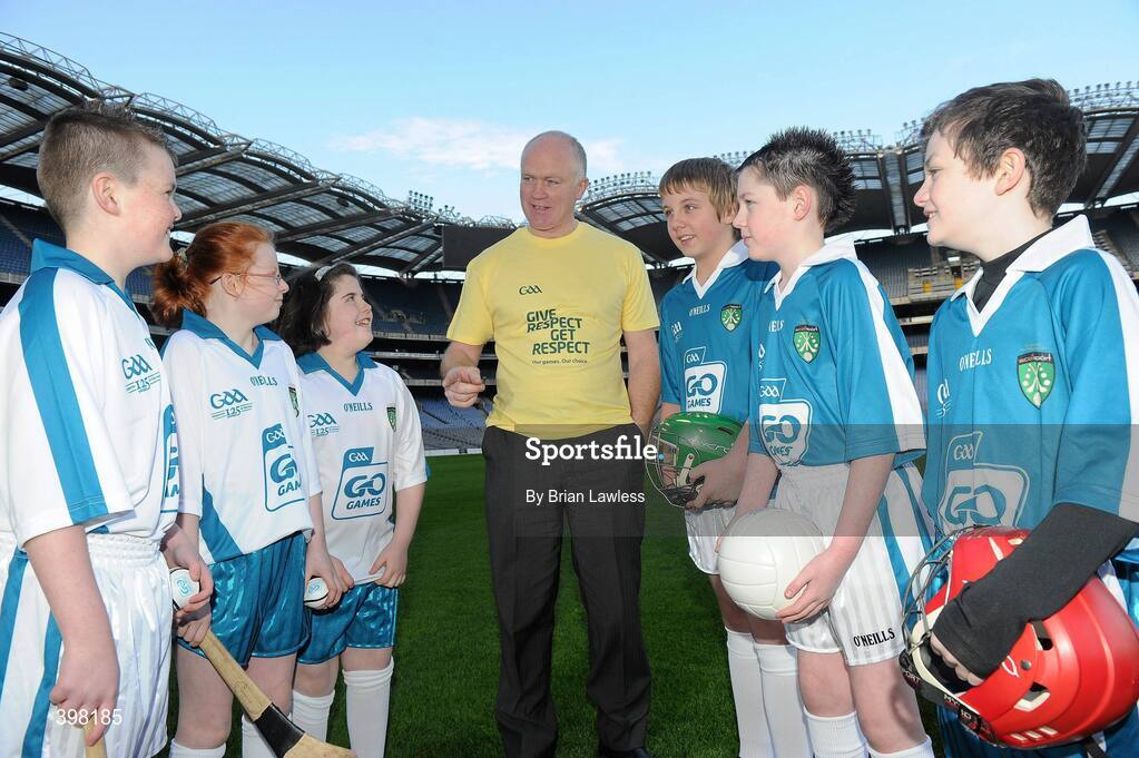 28 January 2010; The GAA has unveiled a new Respect Initiative aimed at fostering a new approach of fair play, mutual respect and good will to Gaelic football and hurling across all grades. A specific programme has been devised with clearly defined roles of responsibility for all of the key participants in our games including players, coaches, parents/guardians, managers and match officials. At the launch is Dublin football legend Barney Rock with pupils from St. Malachy's Primary School Armagh, from left, James Traynor, Kerys McCreesh, Alessia Donaghy, Paul Gacek, Lorcan McClean, and John McConville. GAA Museum Auditorium, Croke Park, Dublin. Picture credit: Brian Lawless / SPORTSFILE  *** Local Caption ***