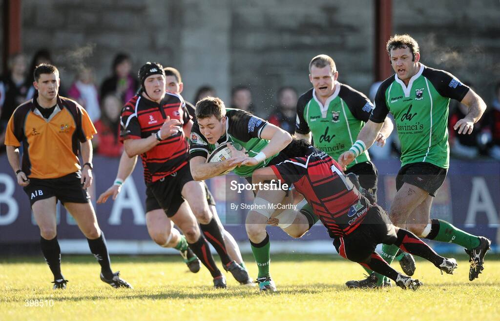 30 January 2010; David Houston, City of Derry, is tackled by Brian Patterson, Armagh. AIB Junior Cup Final, Armagh v City of Derry, Dubarry Park, Athlone, Co. Westmeath. Picture credit: Stephen McCarthy / SPORTSFILE