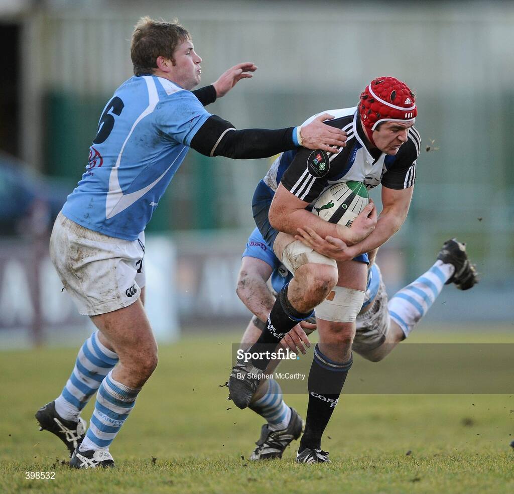 30 January 2010; Billy Holland, Cork Constitution, in action against Paul Neville, left, and Declan Lavery, Garryowen. AIB Cup Final, Cork Constitution v Garryowen, Dubarry Park, Athlone, Co. Westmeath. Picture credit: Stephen McCarthy / SPORTSFILE *** Local Caption ***