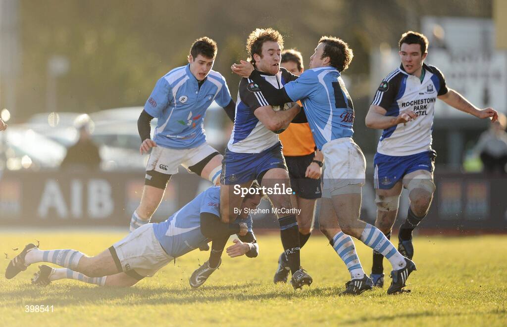 30 January 2010; Evan Ryan, Cork Constitution, in action against Kevin Hartigan, left, and Conan Doyle, Garryowen. AIB Cup Final, Cork Constitution v Garryowen, Dubarry Park, Athlone, Co. Westmeath. Picture credit: Stephen McCarthy / SPORTSFILE