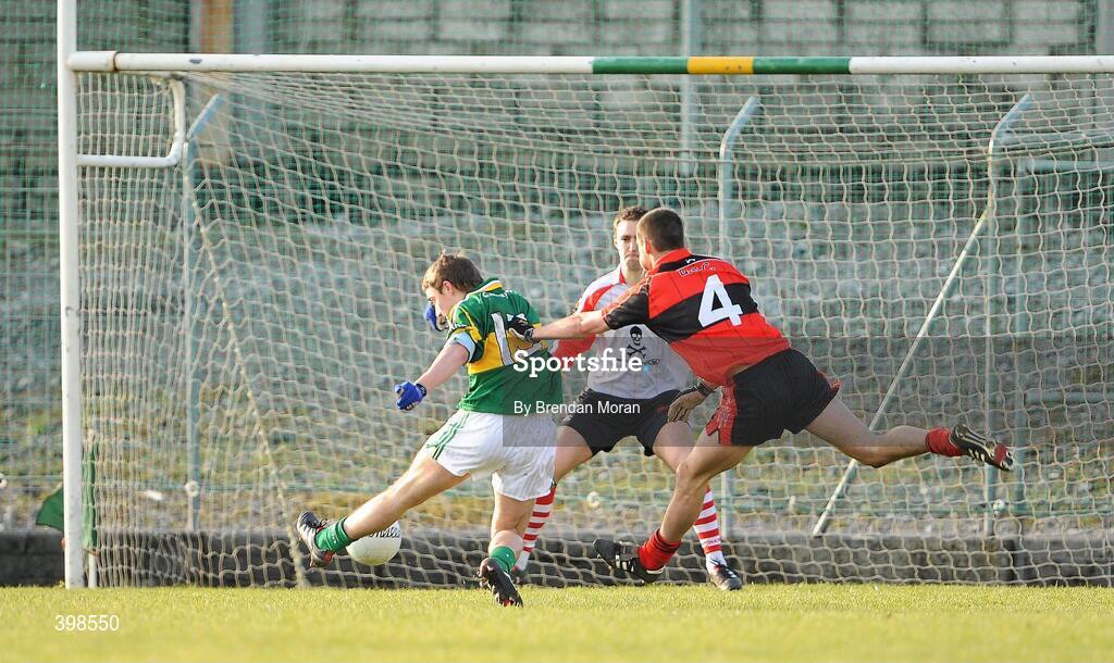 30 January 2010; James O'Donoghue, Kerry, scores his side's goal despite the challenge from Shane Enright, University College Cork. Munster GAA McGrath Cup Senior Football Final, Kerry v University College Cork, Austin Stack Park, Tralee, Co. Kerry. Picture credit: Brendan Moran / SPORTSFILE