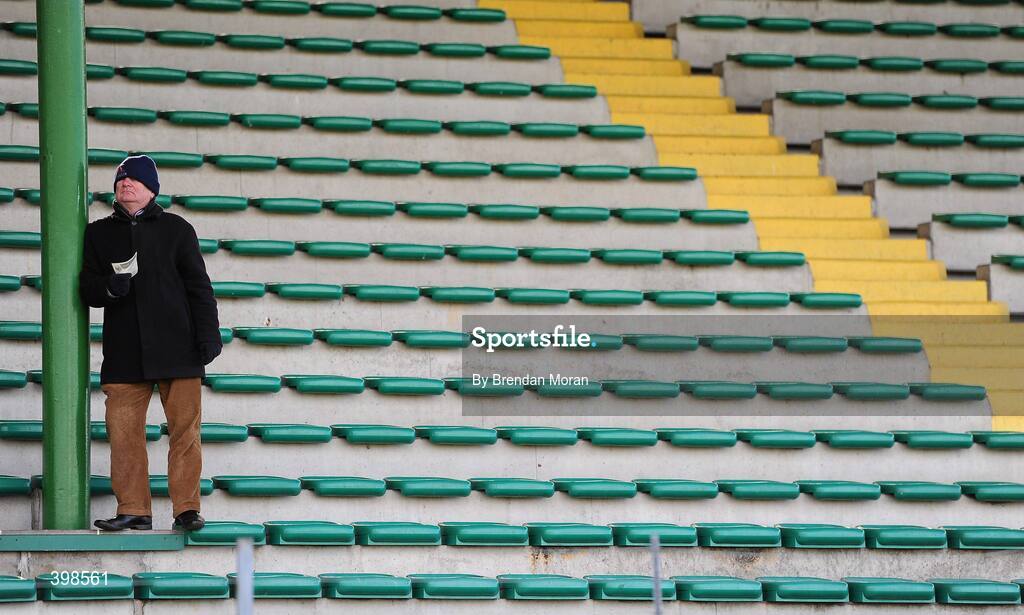 30 January 2010; A supporter stands in the main stand while watching the game. Munster GAA McGrath Cup Senior Football Final, Kerry v University College Cork, Austin Stack Park, Tralee, Co. Kerry. Picture credit: Brendan Moran / SPORTSFILE