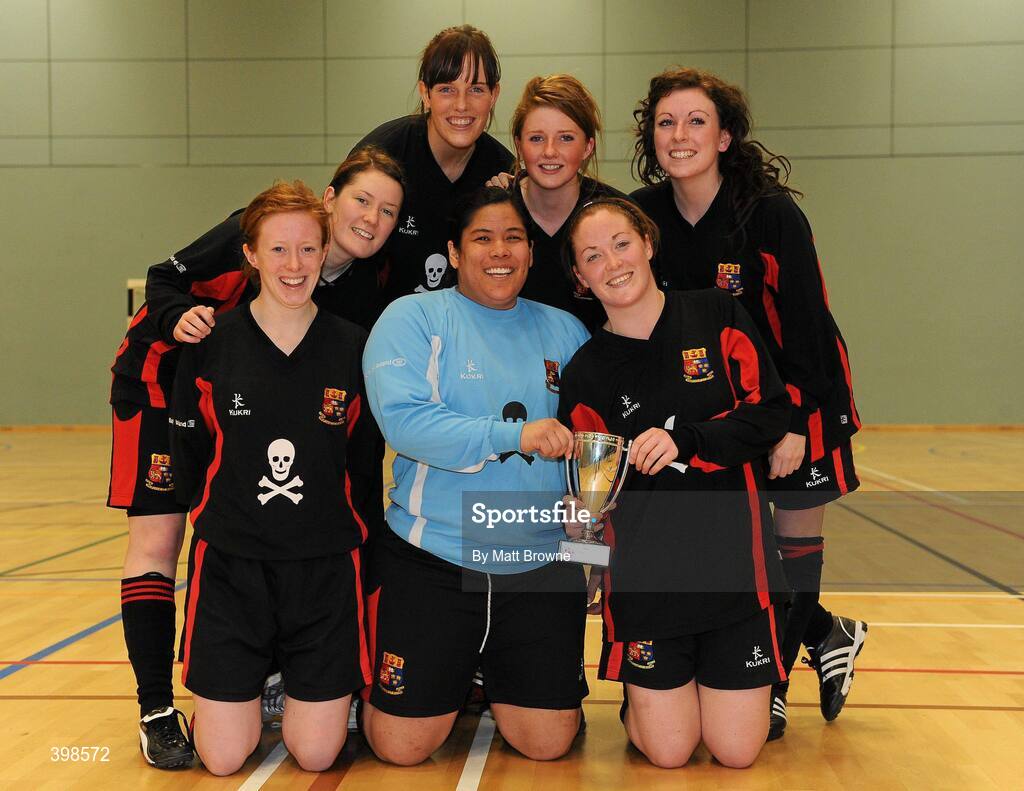 30 January 2010; UCC players, from left, Eimear Feerick, Castlebar, Co. Mayo, Eimear Knightly, Killorglin, Co. Kerry, Trisha Hickey, Clonmel, Co. Tipperary, Megan Morris, USA, Linda Douglas, Waterford City, Alison Roche, Limerick City and Gill Cahill, Cork City, celebrate with the cup after beating UCD. WSCAI National Futsal Cup Final, UCC v UCD, Kingfishers Sports Centre, NUIG, University Road, Galway. Picture credit: Matt Browne / SPORTSFILE