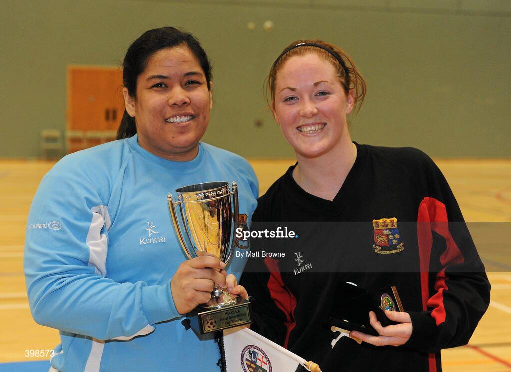 30 January 2010; UCC captains Megan Morris, USA, and Alison Roche, Limerick City, celebrate with the cup. WSCAI National Futsal Cup Final, UCC v UCD, Kingfishers Sports Centre, NUIG, University Road, Galway. Picture credit: Matt Browne / SPORTSFILE