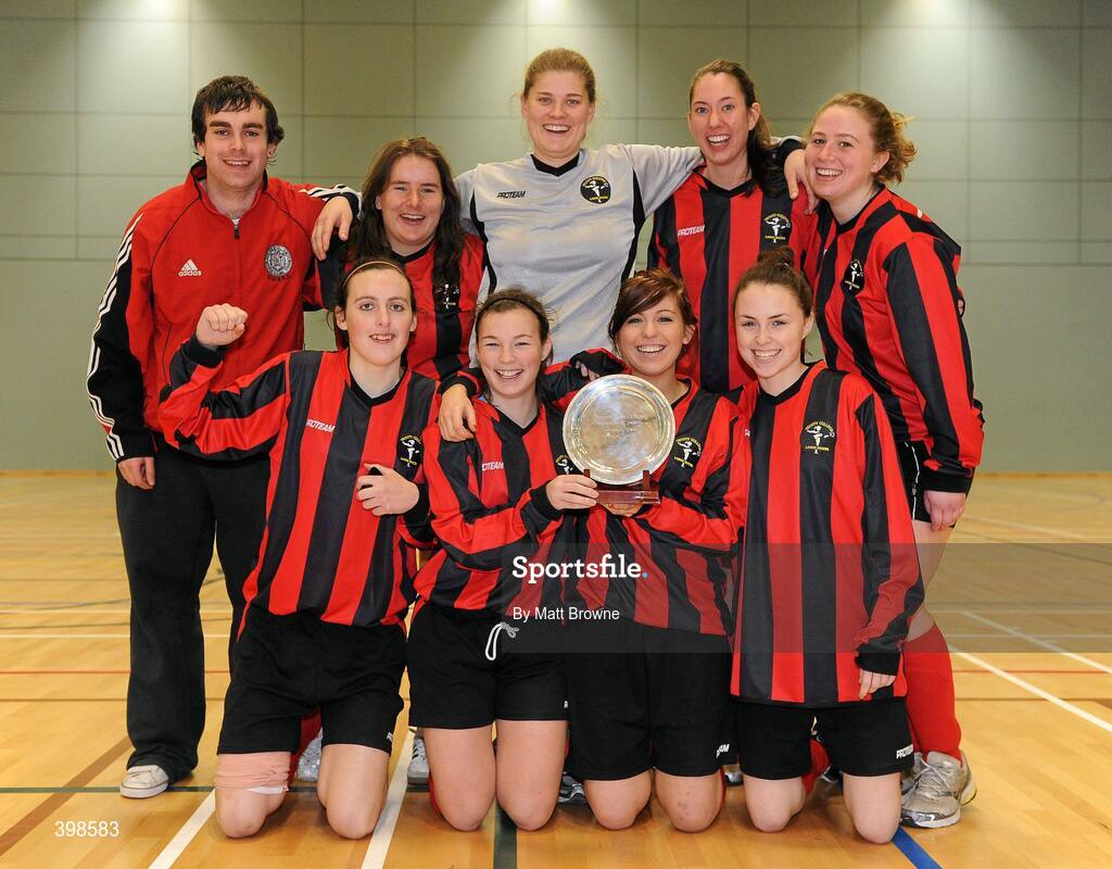 30 January 2010; Trinity players, front row, from left, Hannah Tyrrell, Josephine Amelia Shister, Megan Capper, Tara Harrison, back row, from left, Oisin McMahon Fogarty, coach, Maria De Maio, Cheryl Kemsley, Emily Sheehan, Maeve Duggan. WSCAI National Futsal Plate Final, Trinity v NUIM, Kingfishers Sports Centre, NUIG, University Road, Galway. Picture credit: Matt Browne / SPORTSFILE