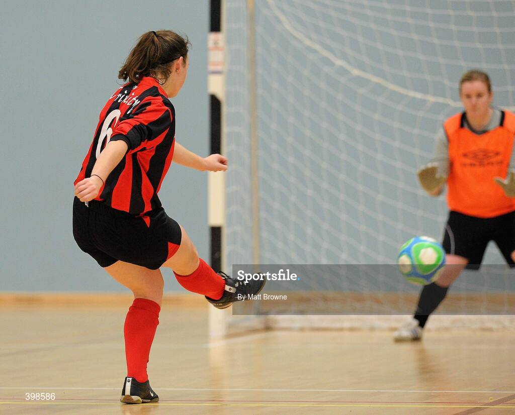 30 January 2010; Josephine Amelia Shister, Trinity, scores the winning penalty against NUIM goalkeeper Michelle Mooney. WSCAI National Futsal Plate Final, Trinity v NUIM, Kingfishers Sports Centre, NUIG, University Road, Galway. Picture credit: Matt Browne / SPORTSFILE