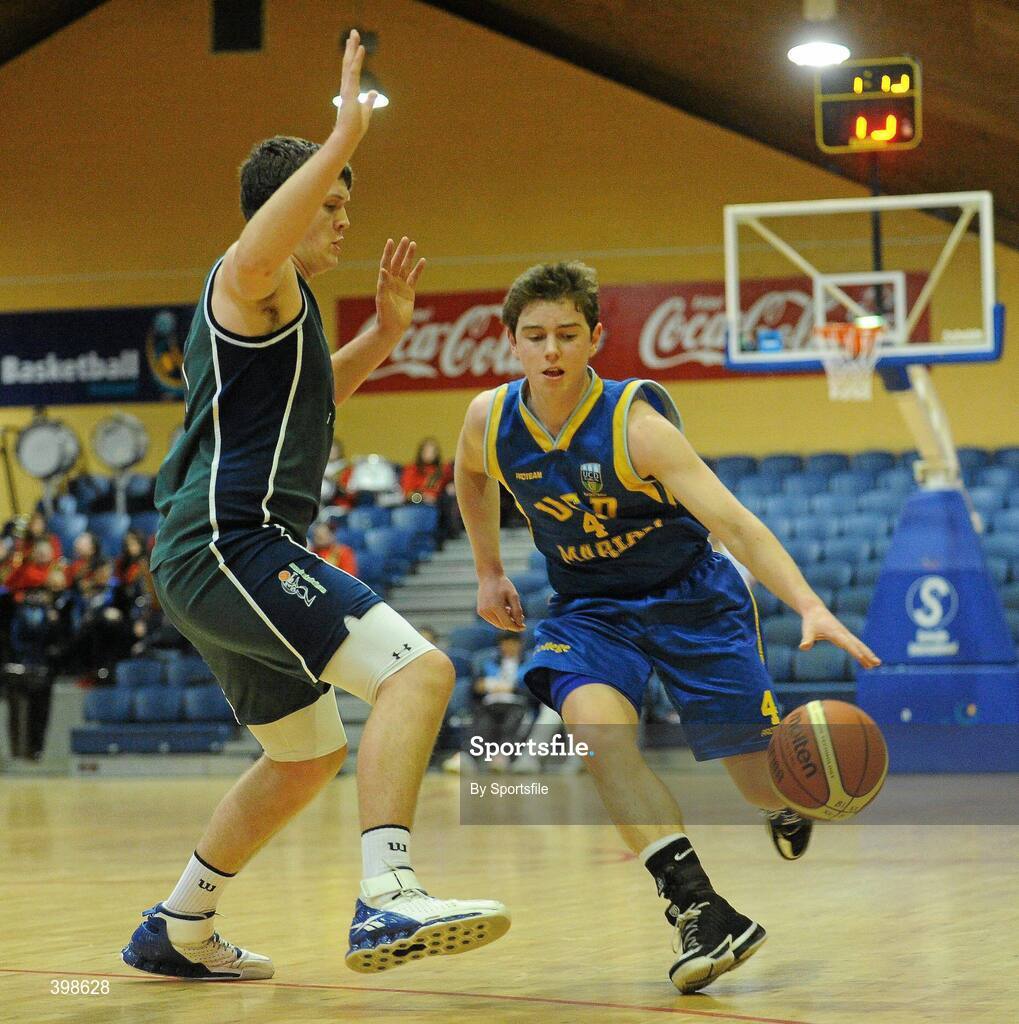 30 January 2010; Cathal Finn, UCD Marian, Dublin, in action against Kenneth Hansberry, Maree, Galway. Mens Under-20 National Cup Final, UCD Marian, Dublin v Maree, Galway, National Basketball Arena, Tallaght, Dublin. Photo by Sportsfile