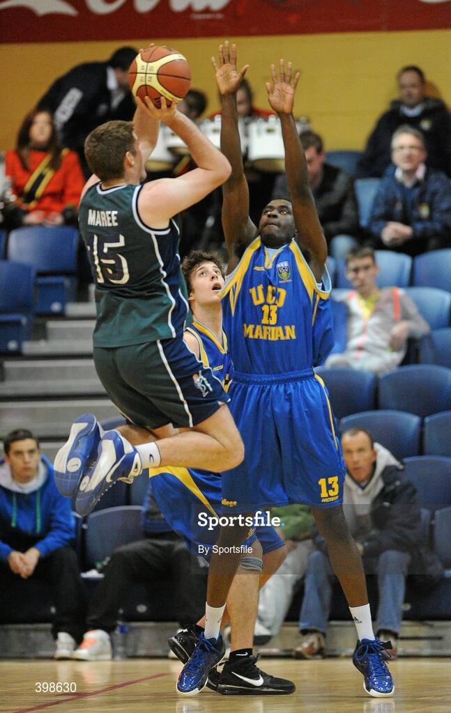 30 January 2010; David Hansberry, Maree, Galway, in action against Kunle Oyateru, UCD Marian, Dublin. Mens Under-20 National Cup Final, UCD Marian, Dublin v Maree, Galway, National Basketball Arena, Tallaght, Dublin. Photo by Sportsfile