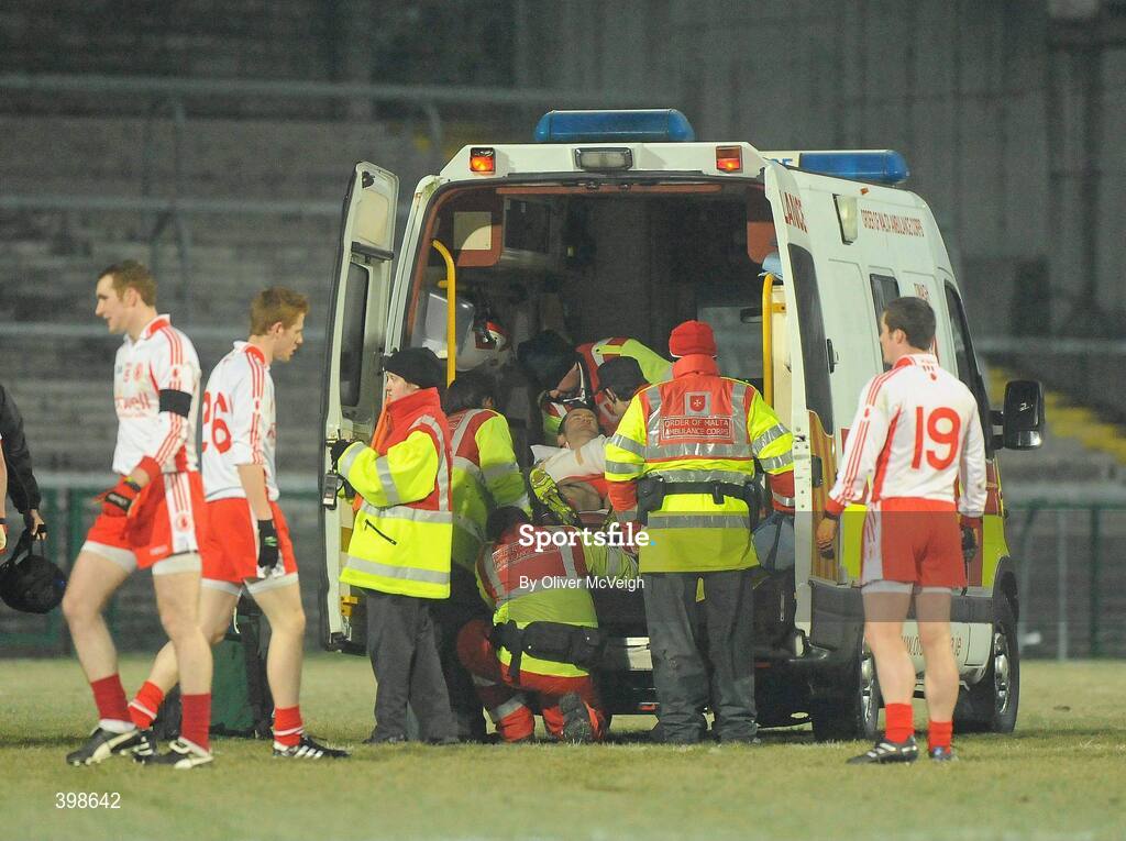 30 January 2010; Stephen O'Neill, Tyrone, leaves the field to be taken away in an Ambulance with a suspected broken elbow. Barrett Sports Lighting Dr. McKenna Cup Final, Donegal v Tyrone, Brewster Park, Enniskillen, Co. Fermanagh. Picture credit: Oliver McVeigh / SPORTSFILE