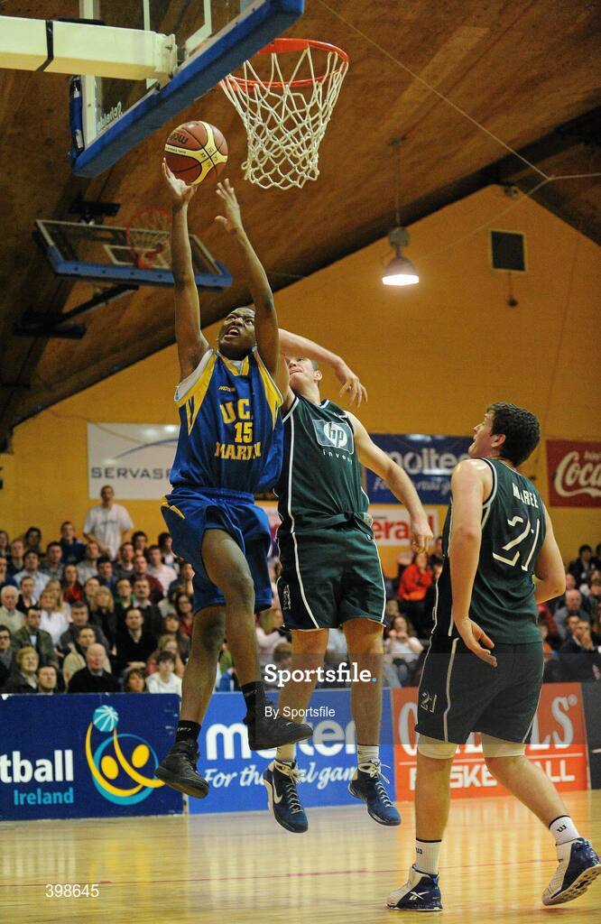 30 January 2010; Irvine Gamede, UCD Marian, Dublin, in action against David Hansberry, Maree, Galway. Mens Under-20 National Cup Final, UCD Marian, Dublin v Maree, Galway, National Basketball Arena, Tallaght, Dublin. Photo by Sportsfile
