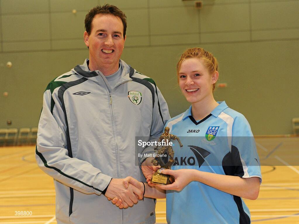 30 January 2010; Ger Dunne, FAI, presents Kellen Brink, UCD, with her player of the tournement trophy. WSCAI National Futsal Cup Final, UCC v UCD, Kingfishers Sports Centre, NUIG, University Road, Galway. Picture credit: Matt Browne / SPORTSFILE