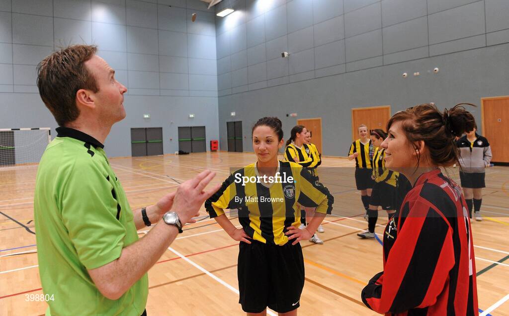 30 January 2010; Megan Capper, Trinity and  Sarah Murray, NUI Maynooth, with the referee before the start if the final. WSCAI National Futsal Plate Final, Trinity v NUIM, Kingfishers Sports Centre, NUIG, University Road, Galway. Picture credit: Matt Browne / SPORTSFILE