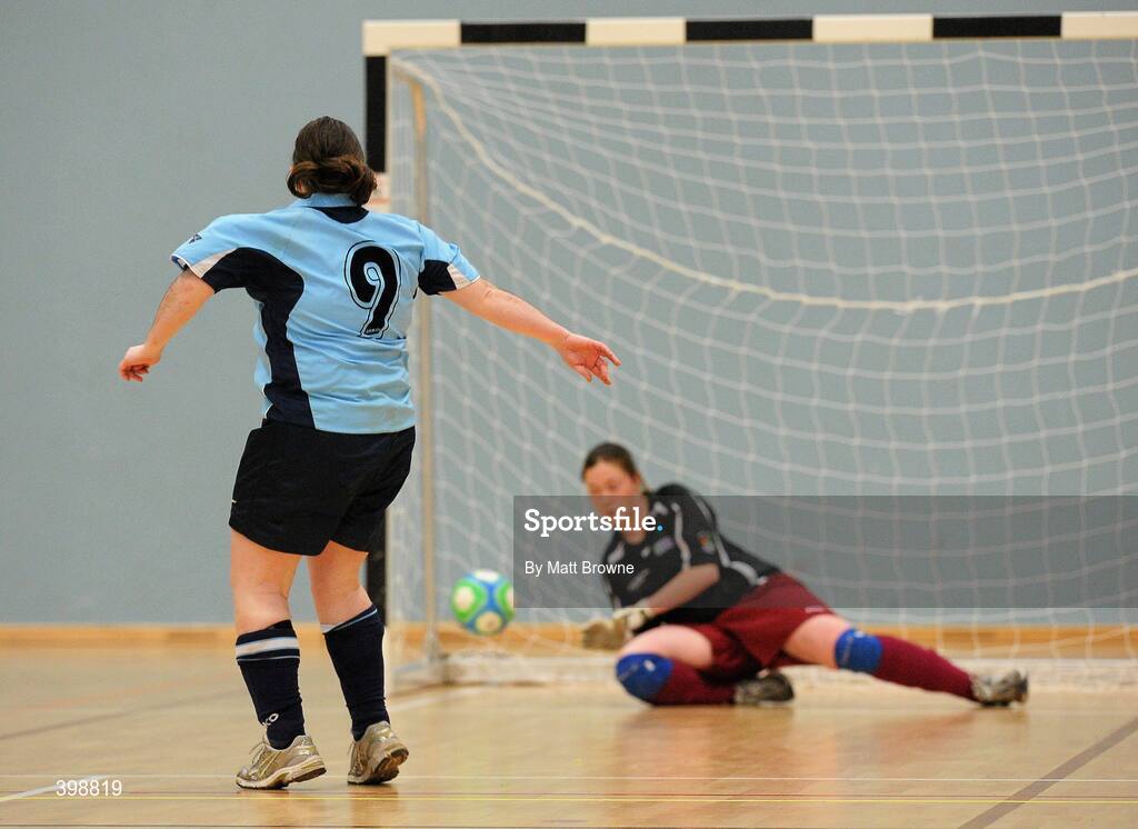 30 January 2010; Rita Connaughton, UCD, scores the winning penalty past NUIG goalkeeper Pádraigín Ní Ghallchóir. WSCAI National Futsal Cup Semi-Final 1, UCD v NUIG, Kingfishers Sports Centre, NUIG, University Road, Galway. Picture credit: Matt Browne / SPORTSFILE