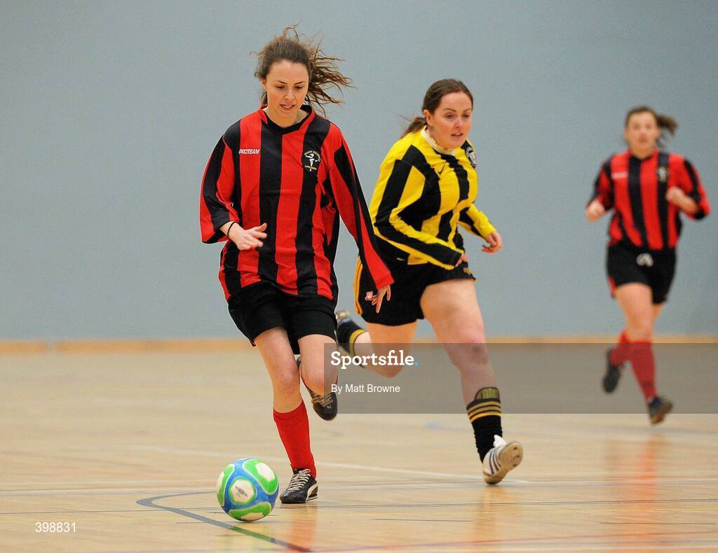 30 January 2010; Tara Harrison, Trinity, in action against Saileog O'Keefe, NUI Maynooth. WSCAI National Futsal Plate Final, Trinity v NUIM, Kingfishers Sports Centre, NUIG, University Road, Galway. Picture credit: Matt Browne / SPORTSFILE