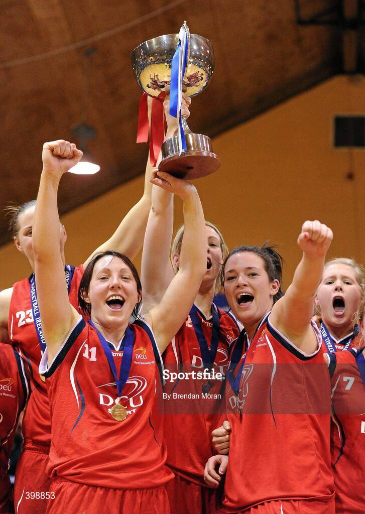 31 January 2010; DCU Mercy captain Lindsay Peat, left, lifts the cup with her team-mates after defeating Team Montenotte Hotel Cork. Women's Superleague National Cup Final 2010, Team Montenotte Hotel Cork v DCU Mercy, National Basketball Arena, Tallaght, Dublin. Picture credit: Brendan Moran / SPORTSFILE