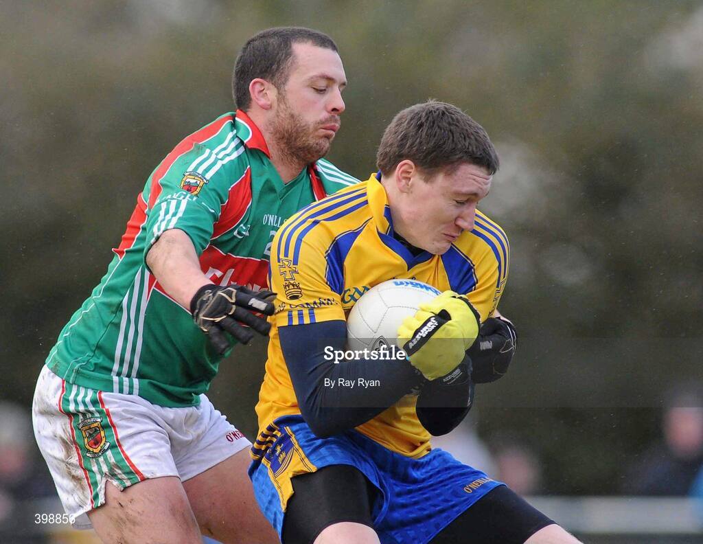 31 January 2010; Michael Killilea, Roscommon, in action against Trevor Mortimer, Mayo. Connacht FBD League, Section A, Round 3, Roscommon v Mayo, Ballinlough GAA Grounds, Ballinclough, Co. Roscommon. Picture credit: Ray Ryan / SPORTSFILE
