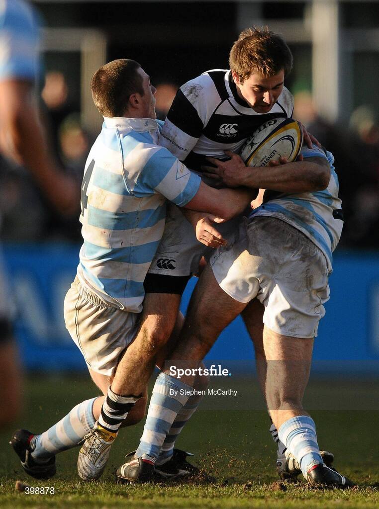 31 January 2010; Donal Murray, Belvedere College, is tackled by Sam Cooke, left, and Con Sheehan, Blackrock College. Leinster Schools Senior Cup First Round, Belvedere College v Blackrock College, Donnybrook Stadium, Donnybrook, Dublin. Picture credit: Stephen McCarthy / SPORTSFILE