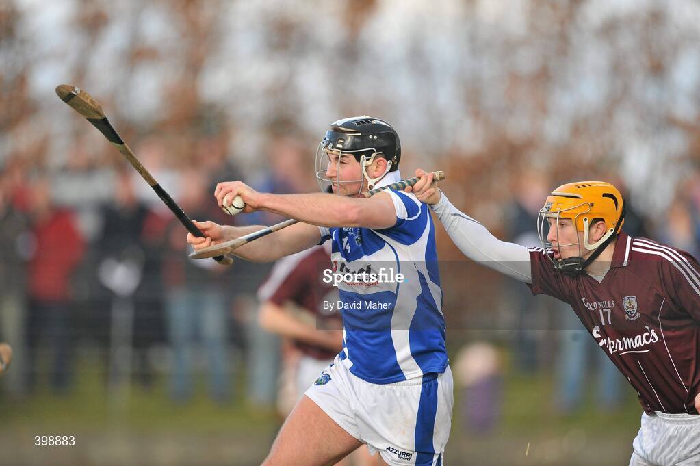 31 January 2010; John Rowney, Laois, in action against Pat Holland, Galway. Walsh Cup Quarter-Final, Laois v Galway, Kelly Daly Park, Rathdowney, Co. Laois. Picture credit: David Maher / SPORTSFILE