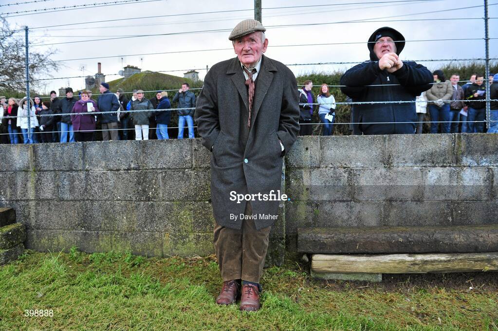 31 January 2010; Spectator Ian Brophy, from Rathdowney, Co Laois, watches on during the game between Laois and Galway. Walsh Cup Quarter-Final, Laois v Galway, Kelly Daly Park, Rathdowney, Co. Laois. Picture credit: David Maher / SPORTSFILE
