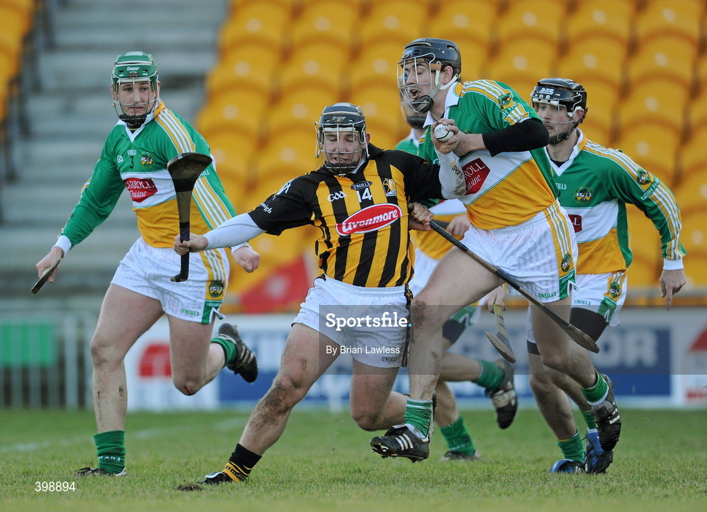 31 January 2010; Richie Hogan, Kilkenny, in action against, from left, Eanna Murphy, Rory Hanniffy, and Stephen Egan, Offaly. Walsh Cup Quarter-Final, Offaly v Kilkenny, O'Connor Park, Tullamore, Co. Offaly. Picture credit: Brian Lawless / SPORTSFILE