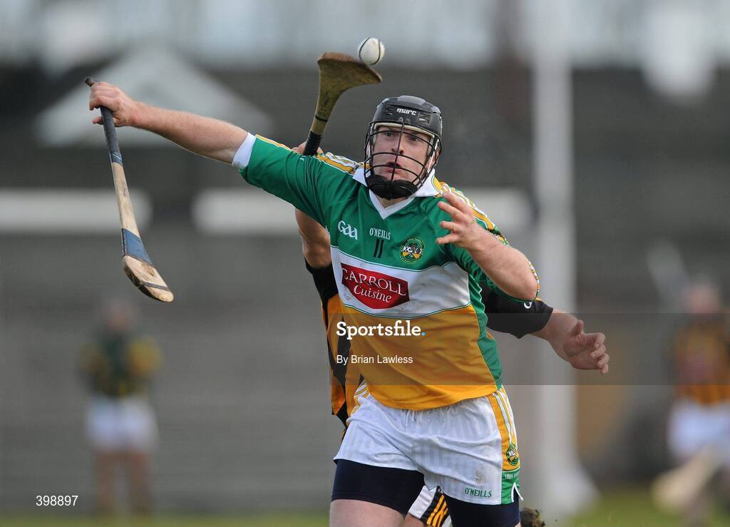 31 January 2010; Joe Brady, Offaly, in action against John Tennyson, Kilkenny. Walsh Cup Quarter-Final, Offaly v Kilkenny, O'Connor Park, Tullamore, Co. Offaly. Picture credit: Brian Lawless / SPORTSFILE