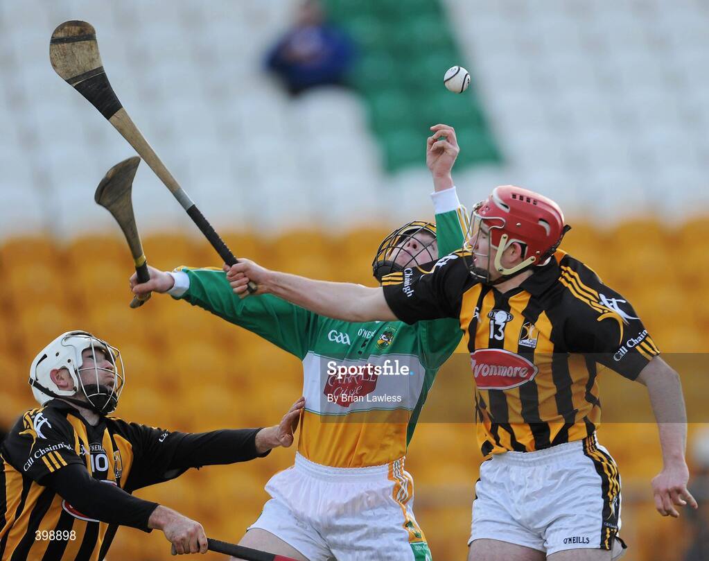 31 January 2010; James Rigney, Offaly, in action against Michael Grace, left, and Martin Boran, Kilkenny. Walsh Cup Quarter-Final, Offaly v Kilkenny, O'Connor Park, Tullamore, Co. Offaly. Picture credit: Brian Lawless / SPORTSFILE