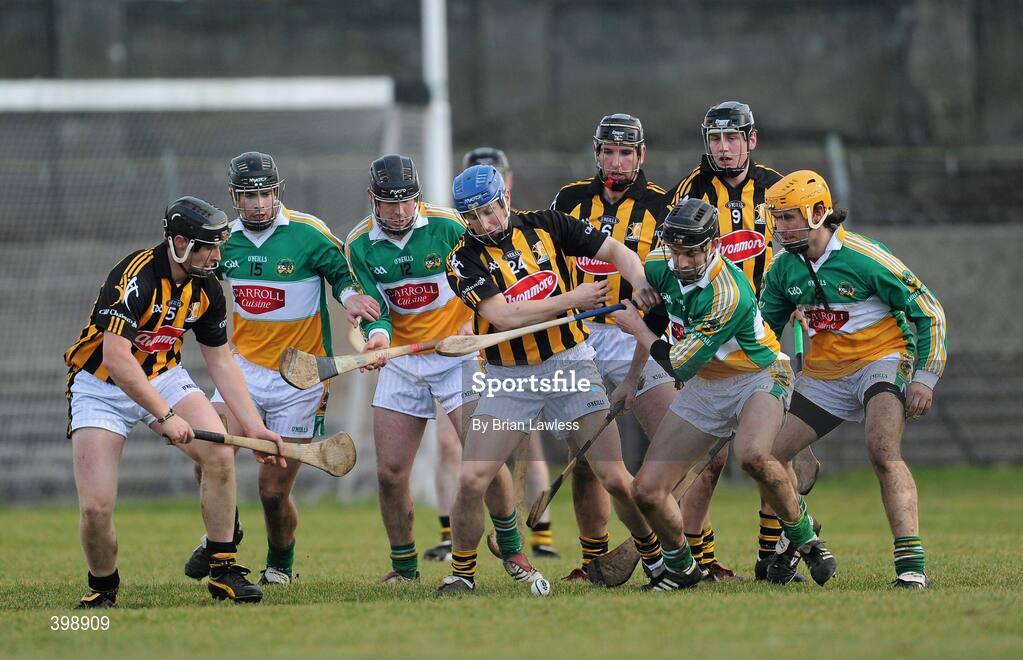 31 January 2010; Niall Walsh, Kilkenny, and Rory Hanniffy, Offaly, battle for possession as their team-mates look on. Walsh Cup Quarter-Final, Offaly v Kilkenny, O'Connor Park, Tullamore, Co. Offaly. Picture credit: Brian Lawless / SPORTSFILE