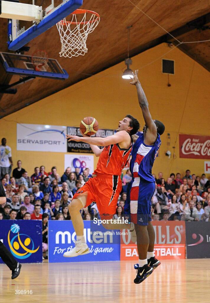31 January 2010; Paddy Kelly, Killester, in action against Joshua Johnson, UCC Demons. Men's Superleague National Cup Final 2010, Killester v UCC Demons, National Basketball Arena, Tallaght, Dublin. Picture credit: Brendan Moran / SPORTSFILE