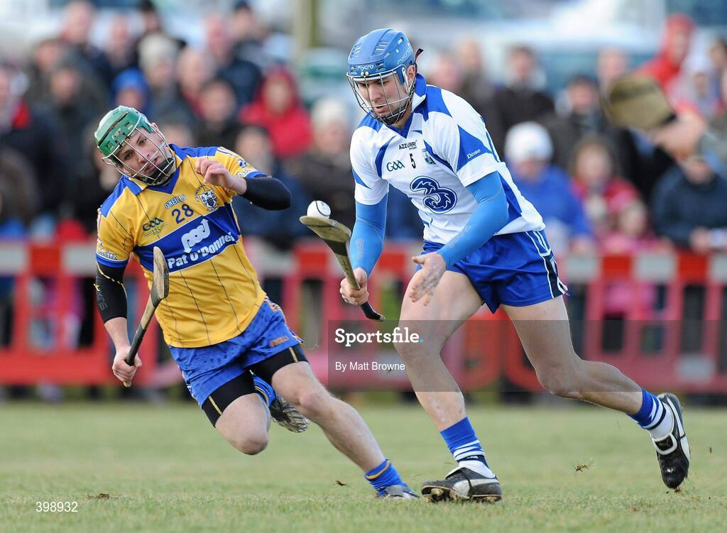 31 January 2010; Declan Prendergast, Waterford, in action against Cormic O'Donovan, Clare. Munster GAA Waterford Crystal Hurling Cup Semi-Final, Waterford v Clare, Ballyduff GAA Grounds, Ballyduff Upper, Waterford. Picture credit: Matt Browne / SPORTSFILE