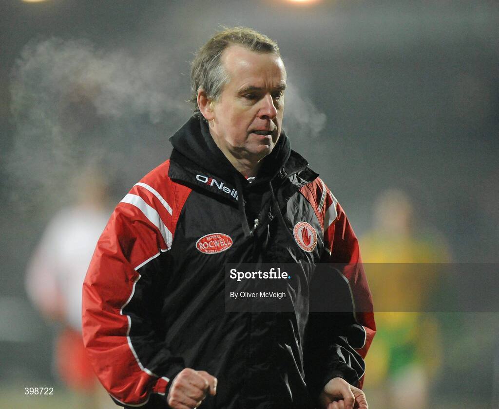 30 January 2010; Tyrone team doctor Seamus Cassidy comes off the field after Stephen O'Neill, Tyrone, leaves the field to be taken away in an ambulance with a suspected broken elbow. Barrett Sports Lighting Dr. McKenna Cup Final, Donegal v Tyrone, Brewster Park, Enniskillen, Co. Fermanagh. Picture credit: Oliver McVeigh / SPORTSFILE