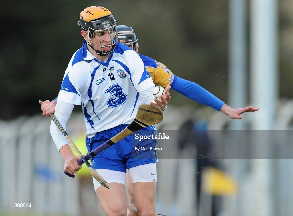 31 January 2010; Maurice Shanahan, Waterford, in action against Pat Donnellan, Clare. Munster GAA Waterford Crystal Hurling Cup Semi-Final, Waterford v Clare, Ballyduff GAA Grounds, Ballyduff Upper, Waterford. Picture credit: Matt Browne / SPORTSFILE