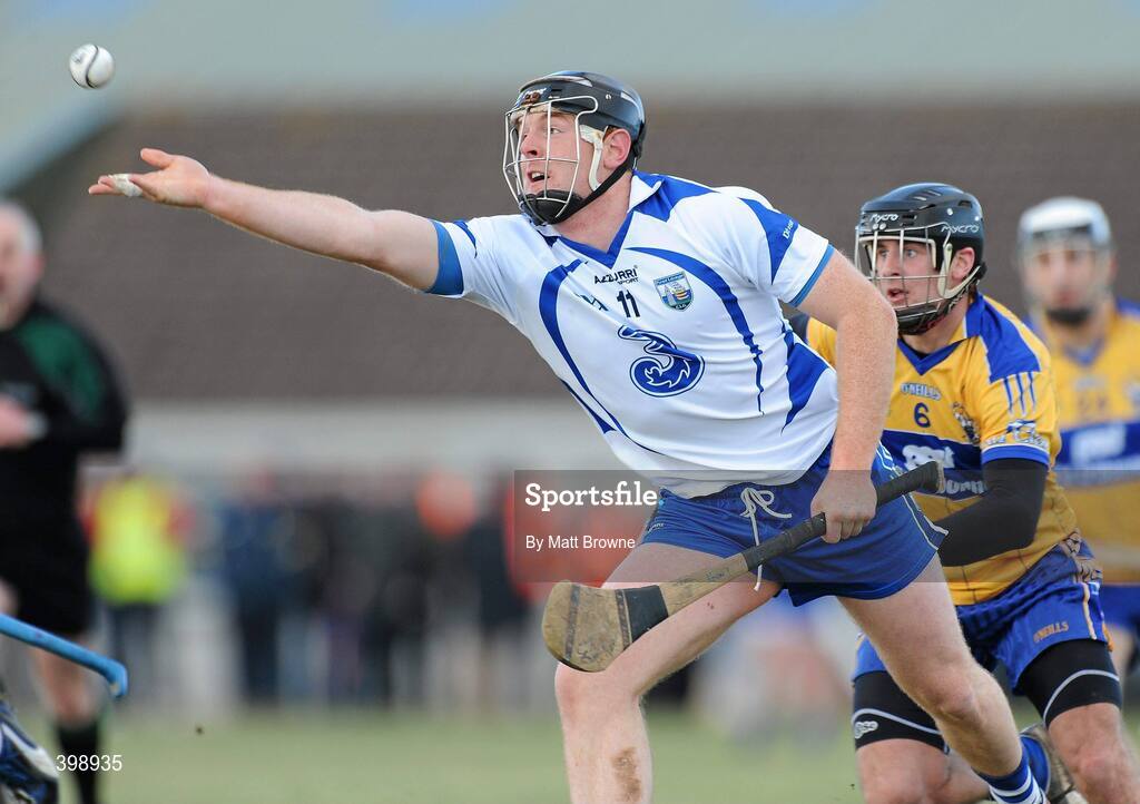 31 January 2010; Kevin Moran, Waterford, in action against Brian O'Connell, Clare. Munster GAA Waterford Crystal Hurling Cup Semi-Final, Waterford v Clare, Ballyduff GAA Grounds, Ballyduff Upper, Waterford. Picture credit: Matt Browne / SPORTSFILE
