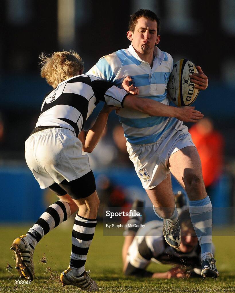 31 January 2010; Joseph O'Sullivan, Blackrock College, is tackled by Marcus Walsh, Belvedere College. Leinster Schools Senior Cup 1st Round, Belvedere College v Blackrock College, Donnybrook Stadium, Donnybrook, Dublin. Picture credit: Stephen McCarthy / SPORTSFILE
