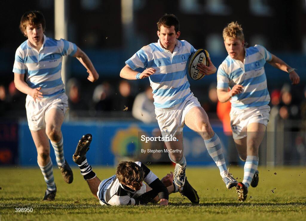 31 January 2010; Joseph O'Sullivan, Blackrock College, escapes the tackle of Mark Kavanagh, Belvedere College. Leinster Schools Senior Cup 1st Round, Belvedere College v Blackrock College, Donnybrook Stadium, Donnybrook, Dublin. Picture credit: Stephen McCarthy / SPORTSFILE