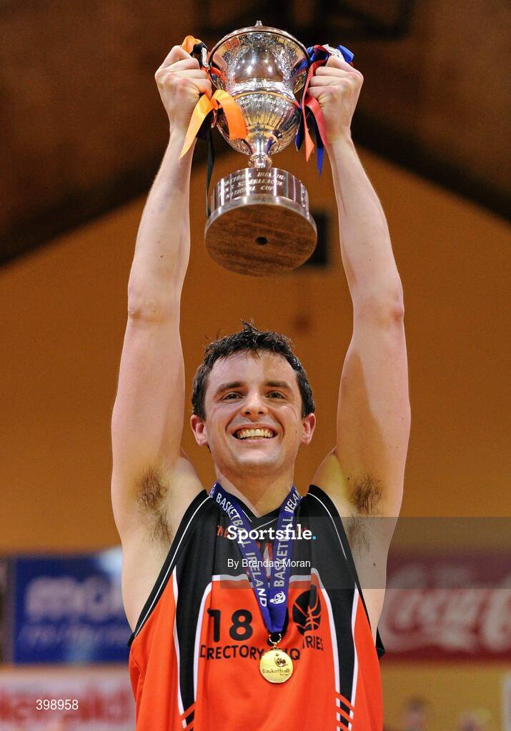 31 January 2010; Killester captain Paddy Kelly lifts the cup after victory over UCC Demons. Men's Superleague National Cup Final 2010, Killester v UCC Demons, National Basketball Arena, Tallaght, Dublin. Picture credit: Brendan Moran / SPORTSFILE